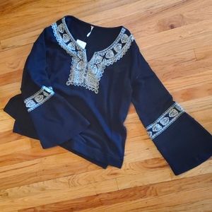 Embroidered bell sleeve tunic top